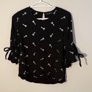 Elegant Black Key Print Blouse with Tie Sleeves